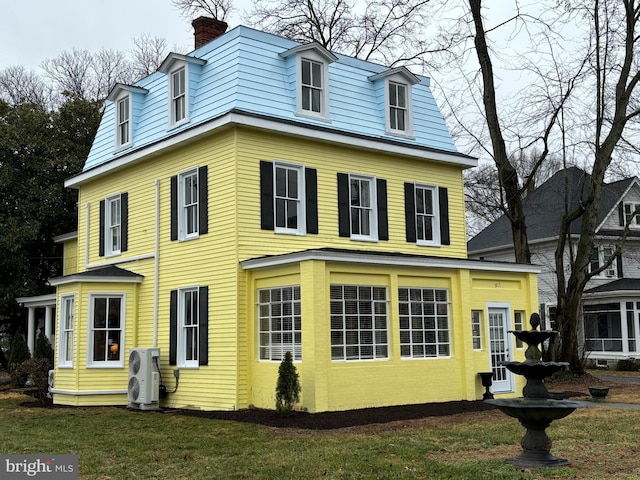 view of home's exterior with ac unit