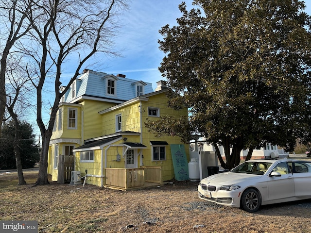 view of front facade with central AC unit