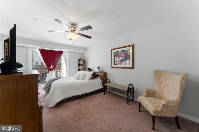 carpeted bedroom featuring access to exterior and ceiling fan