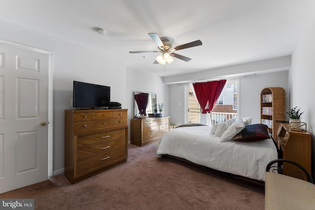 carpeted bedroom with ceiling fan and access to outside