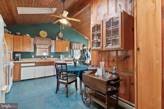 kitchen with tile patterned floors, sink, wooden ceiling, and white appliances