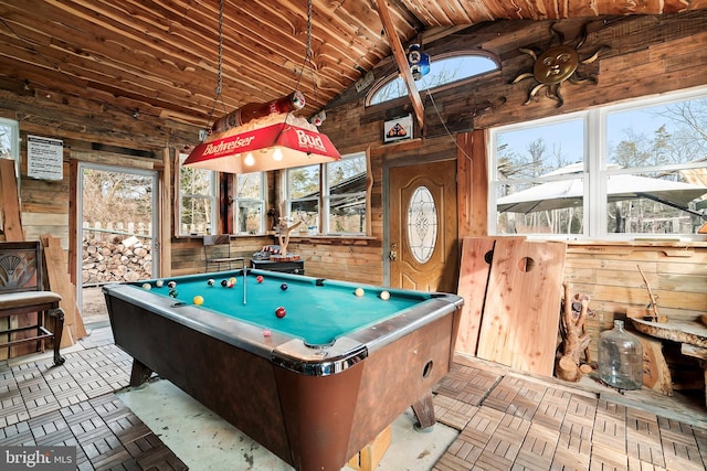 playroom with lofted ceiling, pool table, wooden walls, and light parquet floors