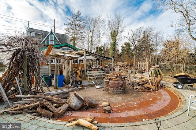 exterior space with a fire pit