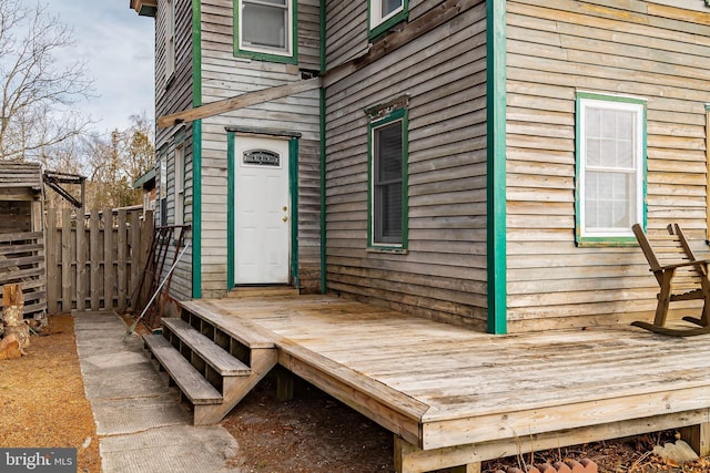 entrance to property with a deck