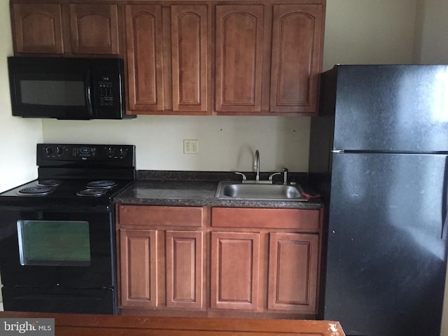 kitchen featuring sink and black appliances