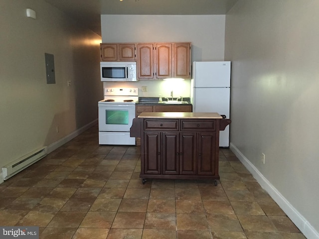 kitchen with baseboard heating, white appliances, sink, and a kitchen island