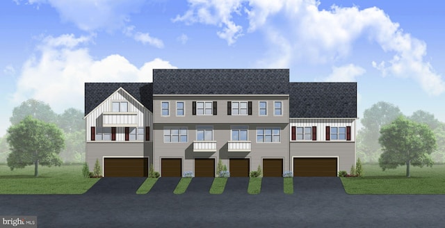 view of front facade with board and batten siding, an attached garage, driveway, and roof with shingles