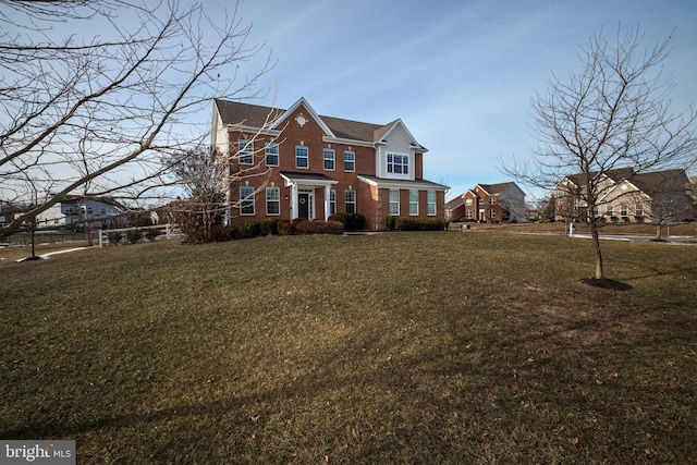 view of front facade with a front yard