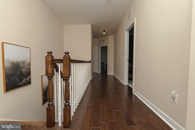 hall featuring dark wood-type flooring