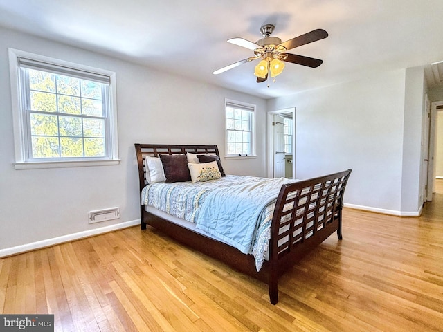 bedroom featuring ceiling fan and light wood-type flooring