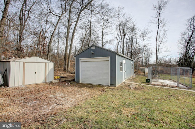 garage featuring a yard