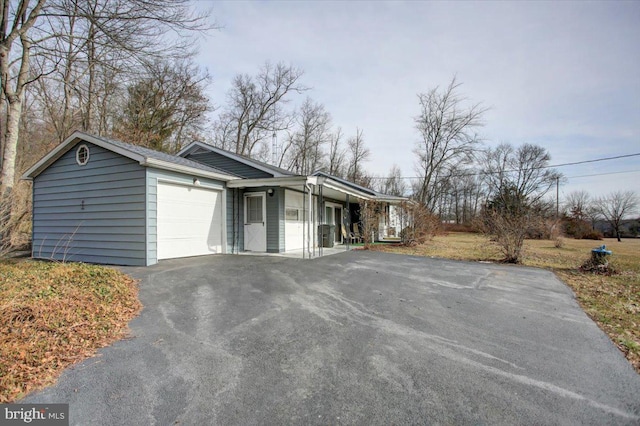 view of side of property featuring a garage