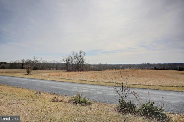 view of street featuring a rural view