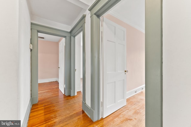 hallway featuring light hardwood / wood-style flooring