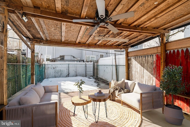 exterior space with ceiling fan