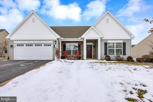 view of front of property featuring a garage