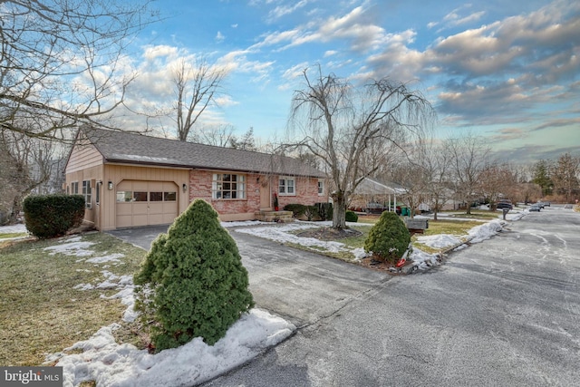 single story home featuring a garage