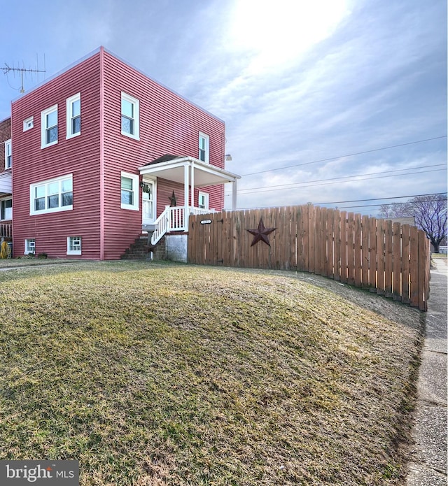 exterior space with a front lawn