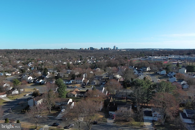 birds eye view of property with a residential view