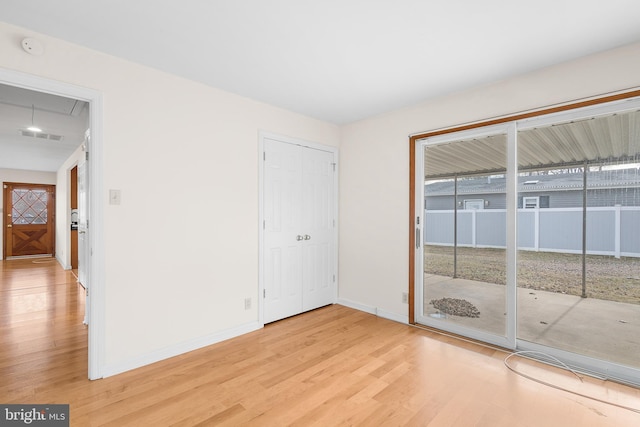 empty room featuring light wood-type flooring