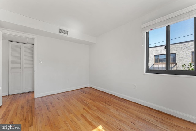 unfurnished bedroom featuring light hardwood / wood-style floors