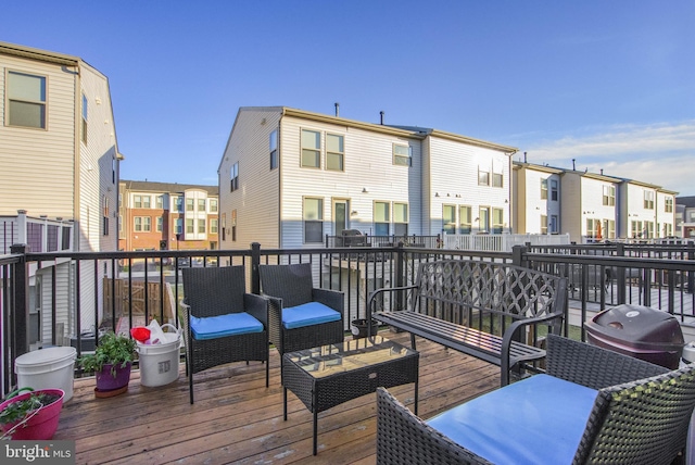 wooden deck featuring grilling area