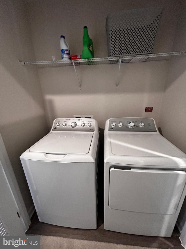 laundry area with washer and clothes dryer