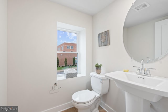 bathroom with sink and toilet