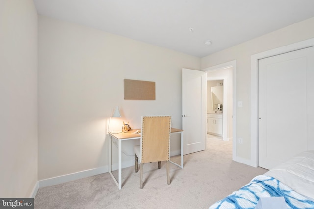 bedroom with light colored carpet