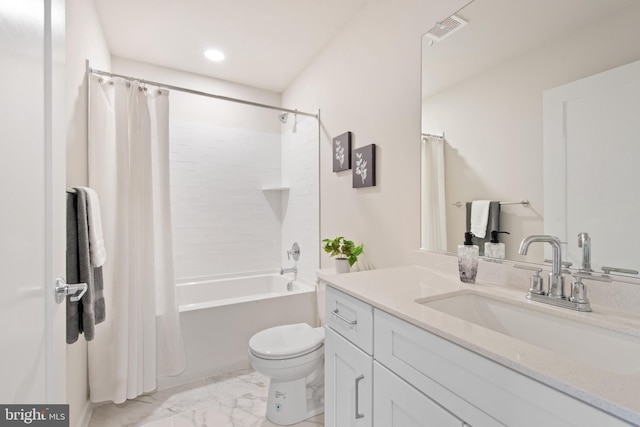 full bathroom featuring vanity, shower / bath combination with curtain, and toilet