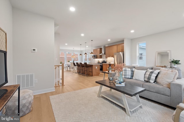 living room featuring light hardwood / wood-style floors