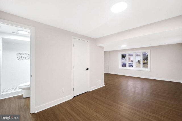 interior space with dark hardwood / wood-style flooring