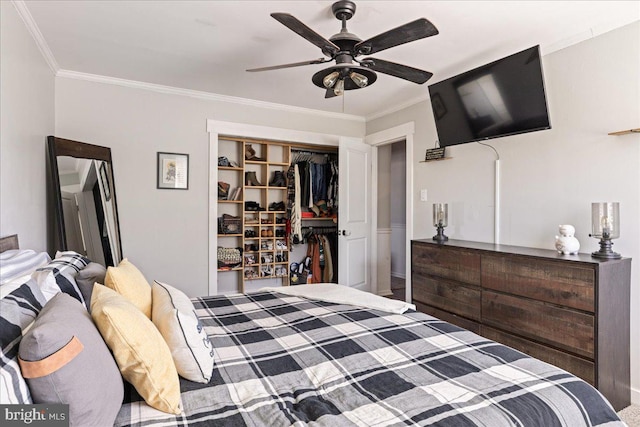 bedroom featuring crown molding, a closet, and ceiling fan