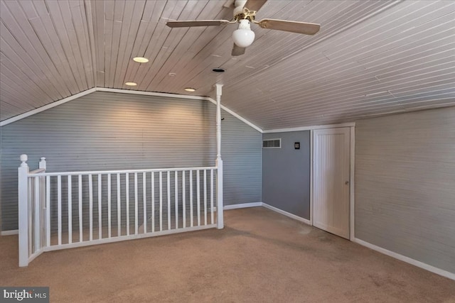 bonus room featuring lofted ceiling, wood ceiling, carpet floors, and ceiling fan