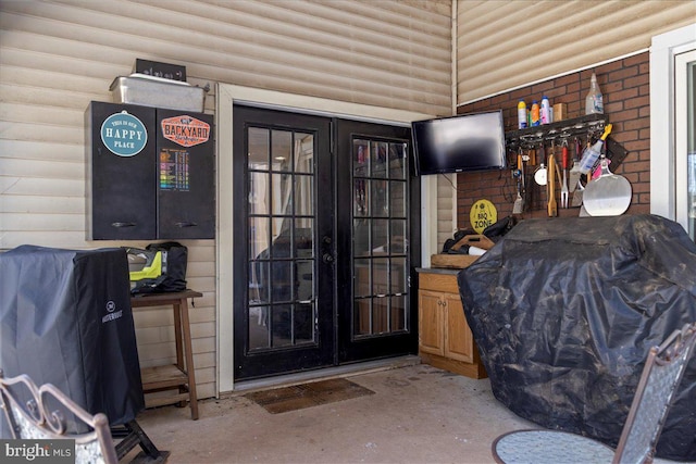 doorway to property featuring french doors