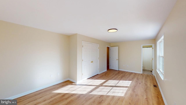 unfurnished bedroom with light hardwood / wood-style flooring