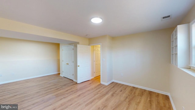 unfurnished bedroom featuring light hardwood / wood-style flooring