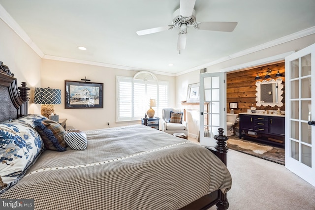 carpeted bedroom featuring ornamental molding, french doors, and ceiling fan