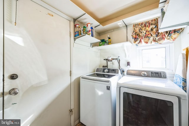 laundry area featuring independent washer and dryer