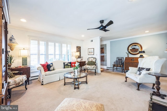 living room featuring ceiling fan, ornamental molding, light carpet, and a baseboard heating unit