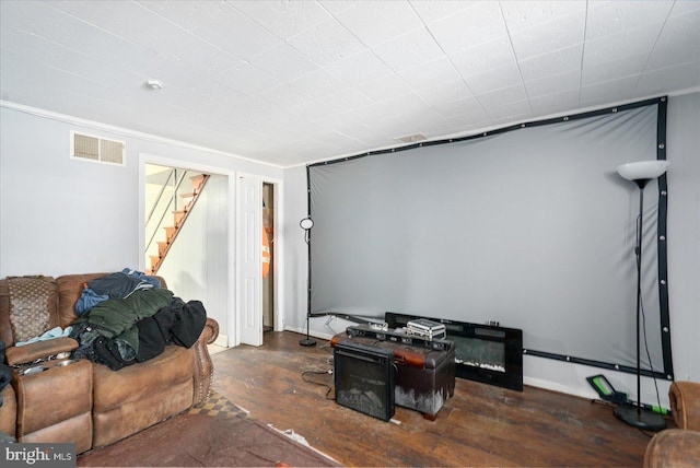 living room featuring dark wood-type flooring