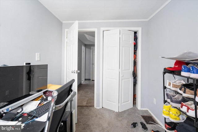 office with crown molding and carpet flooring