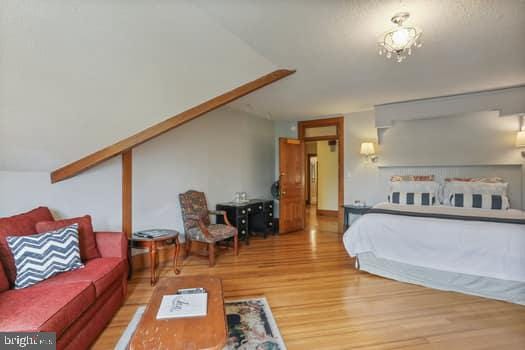 bedroom featuring hardwood / wood-style floors