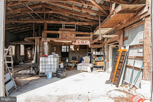 miscellaneous room featuring lofted ceiling