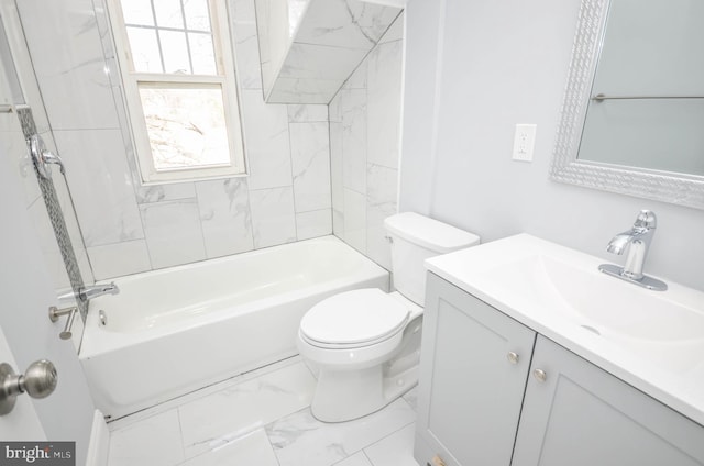 full bathroom with vanity, toilet, and tiled shower / bath