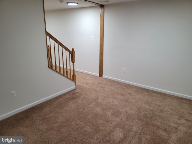 basement featuring carpet flooring