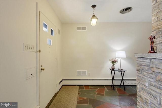 laundry area with a baseboard heating unit