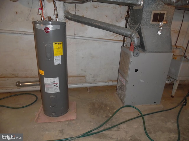 utility room with electric water heater and heating unit