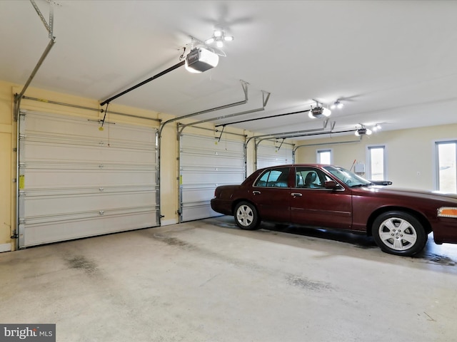 garage featuring a garage door opener