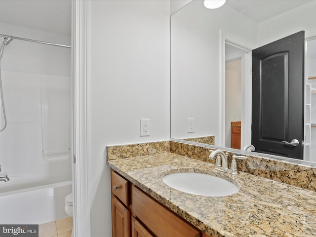 full bathroom with tile patterned floors, vanity, toilet, and tub / shower combination